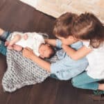 Geschwisterfoto mit Baby