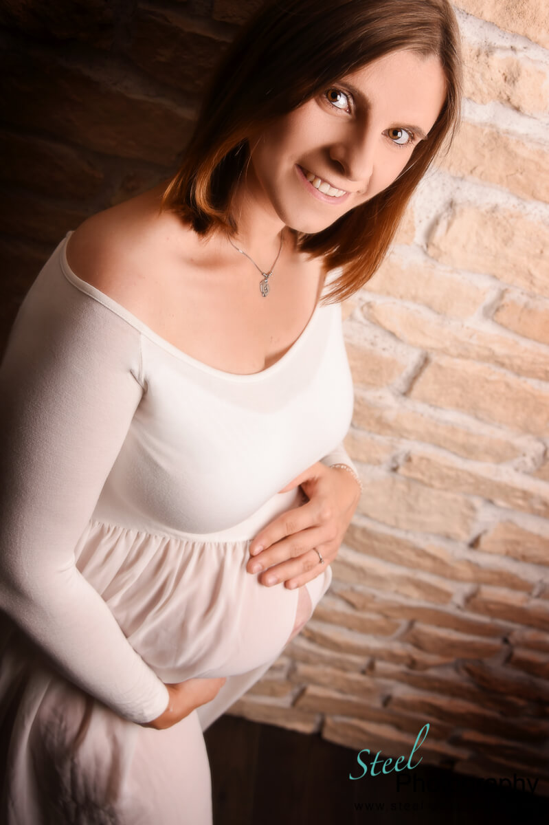 Schwangere von oben fotografiert